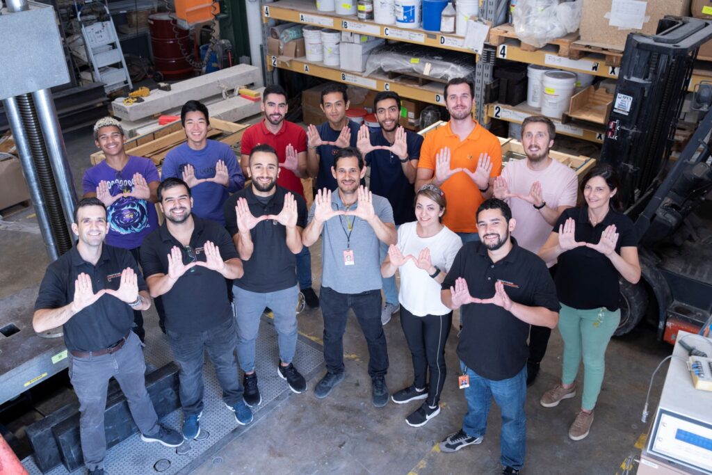 Structures and Materials Lab team standing in accredited testing facility